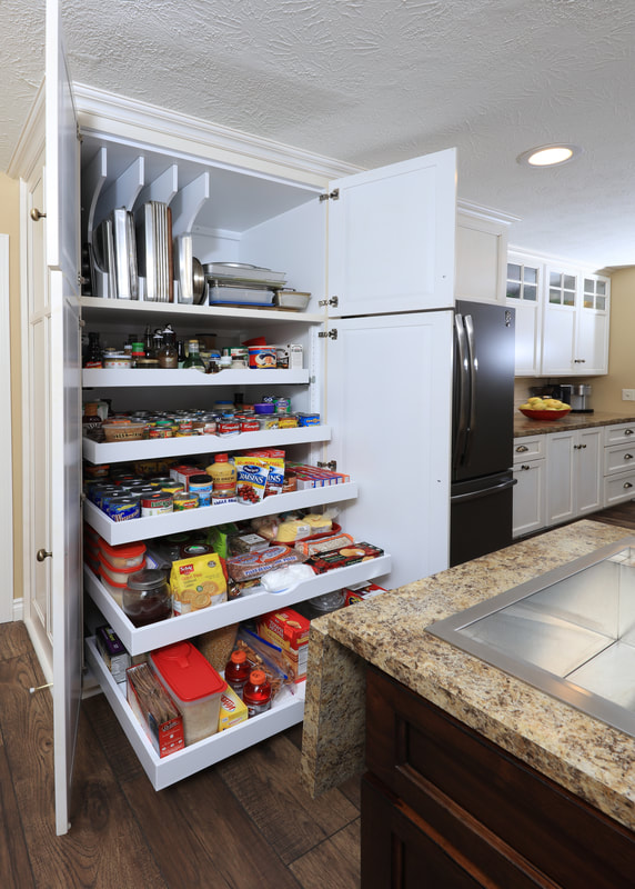 Custom Built Kitchen pantry with adjustable roll out shelves and cookie tray dividers