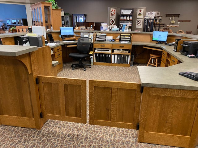 "Amish woodworkers' expertise showcased in Furniture store sales pit!''
