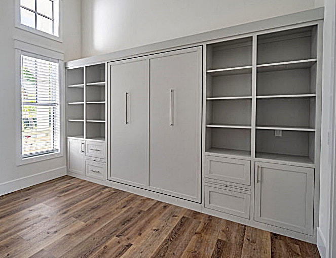 "Functional, stylish and space-saving Amish-built Murphy Bed with bookcases for your home office space"